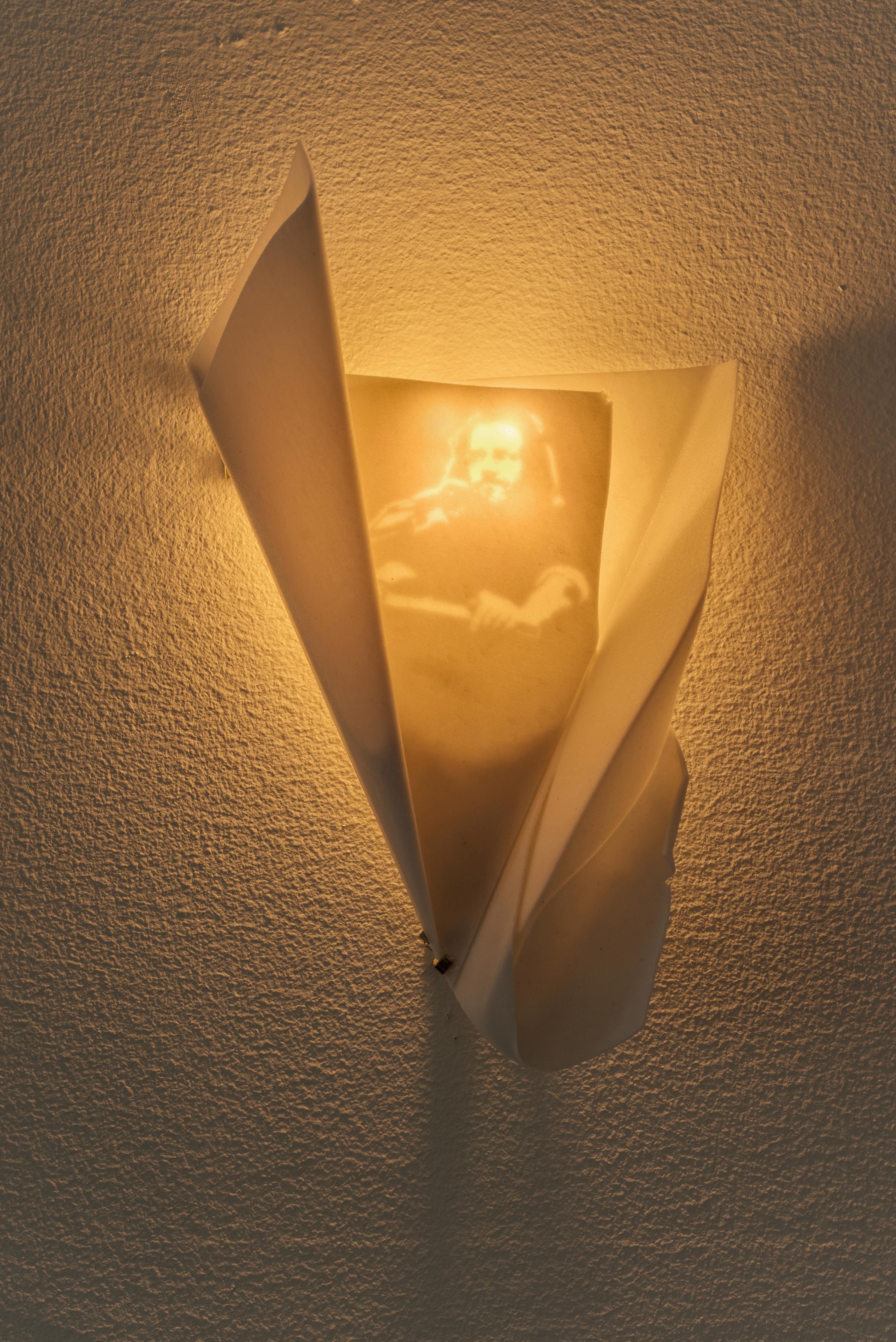 Sconce (This is Water)<br>2016<br>Sandstone, lighting hardware<br>4.938 x 8.028 in (12.5 x 20.4 cm)